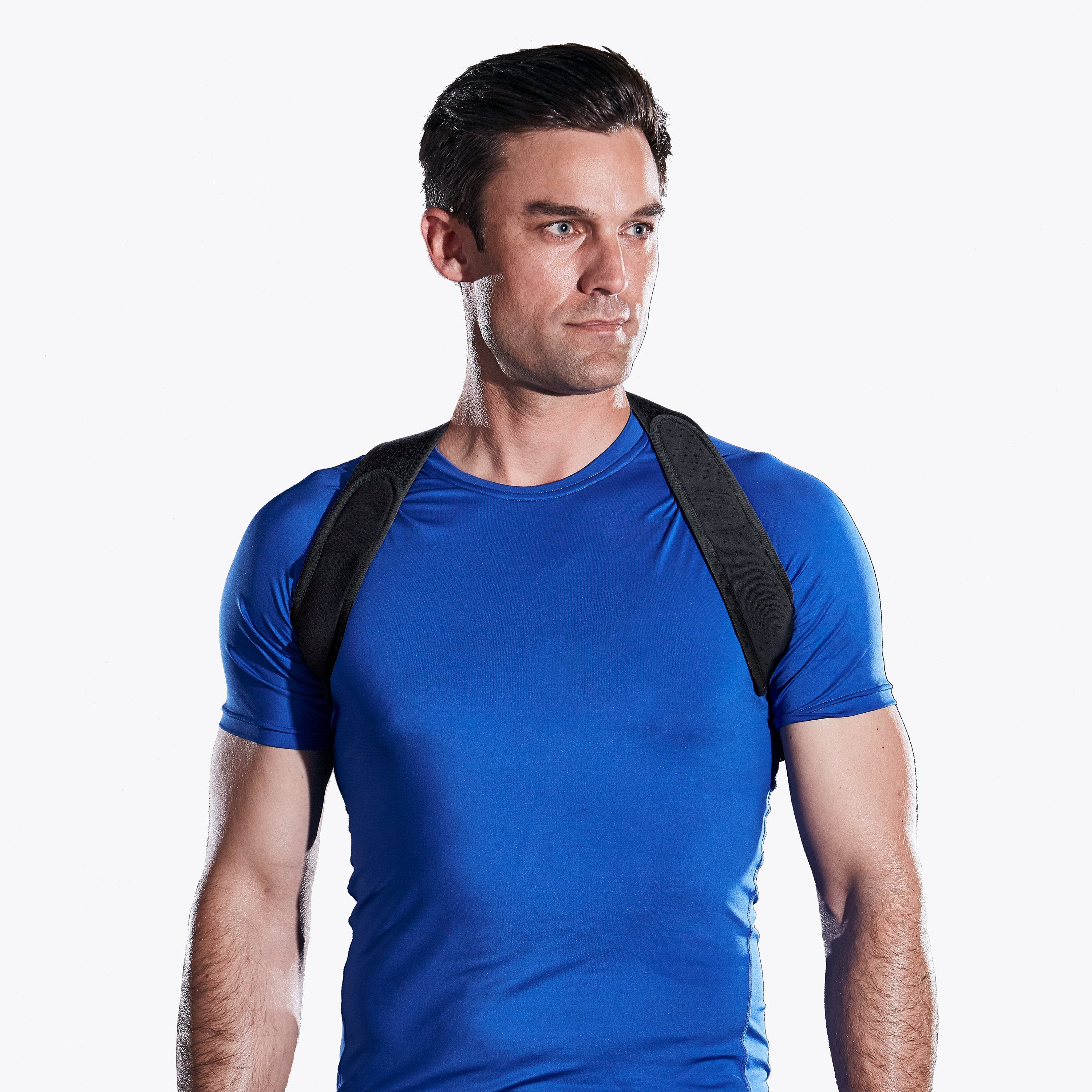 restore neoprene posture corrector  on male model